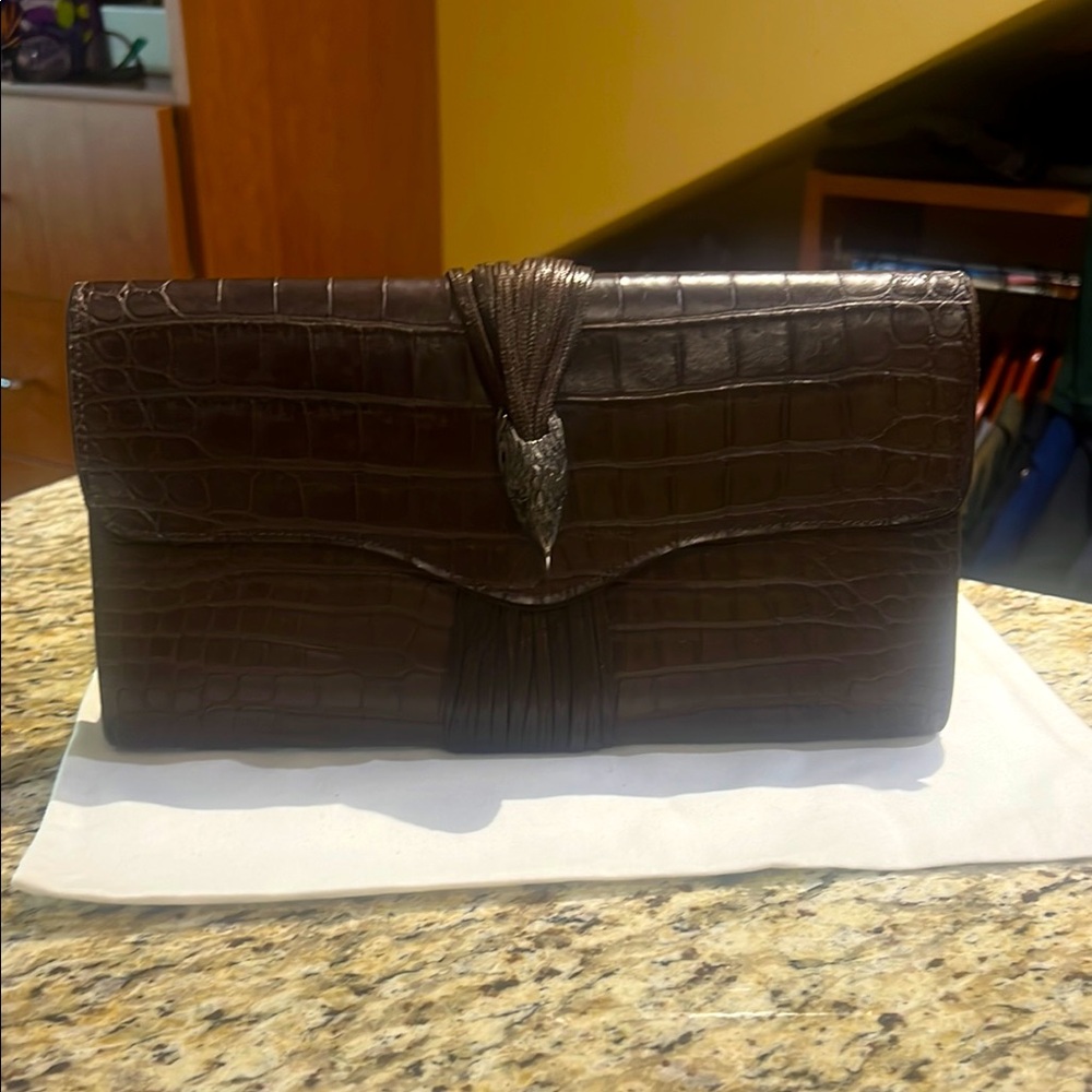 Elegant Brown Crocodile Leather woman’s clutch.